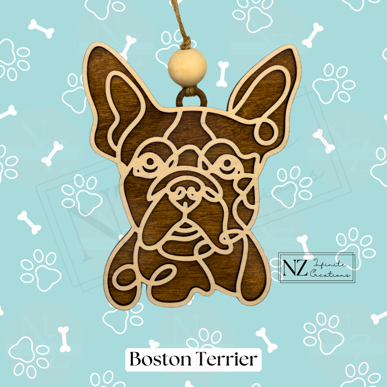 Boston Terrier Line Art Ornament crafted from wood with a sleek laser-engraved design. Includes twine and a wooden bead for easy hanging. A delightful gift for Boston Terrier enthusiasts and a lovely addition to holiday decor.