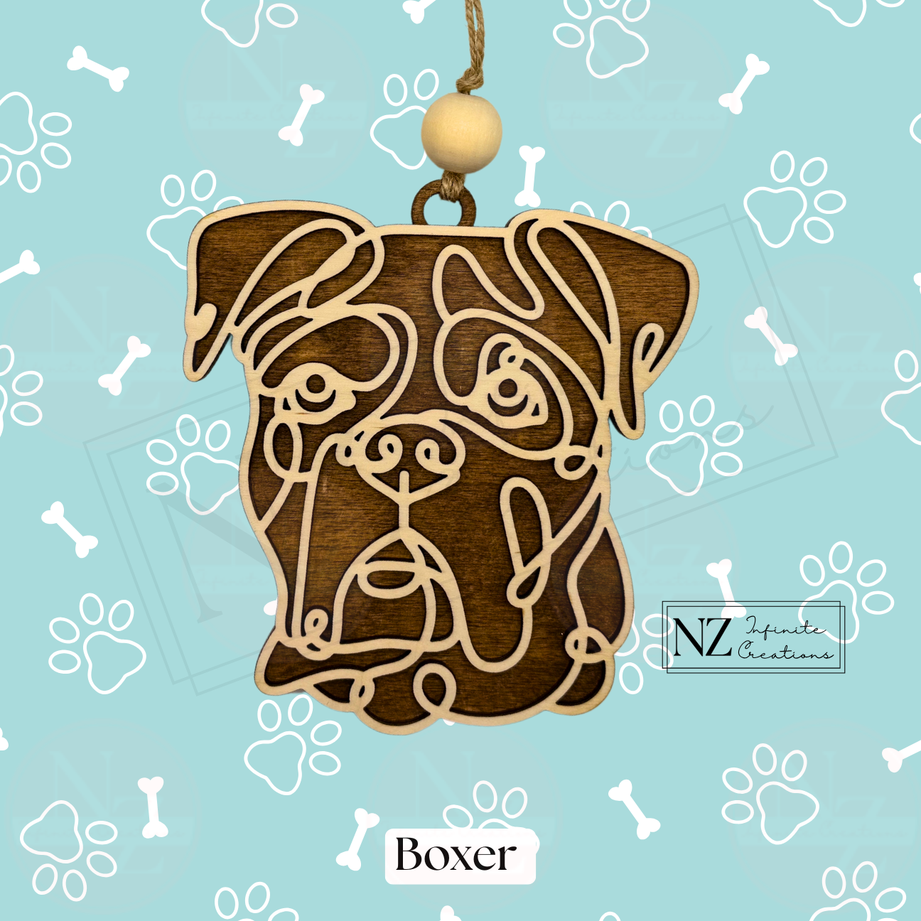 Boxer Dog Line Art Ornament crafted from wood with a sleek laser-engraved design. Includes twine and a wooden bead for hanging. A perfect gift for Boxer dog lovers and a delightful addition to your holiday decor.