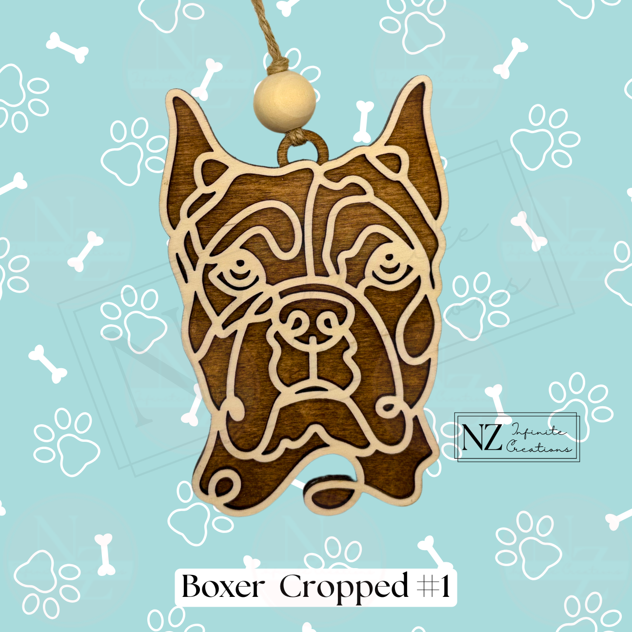 Boxer Dog Line Art Ornament crafted from wood with a sleek laser-engraved design. Includes twine and a wooden bead for hanging. A perfect gift for Boxer dog lovers and a delightful addition to your holiday decor.