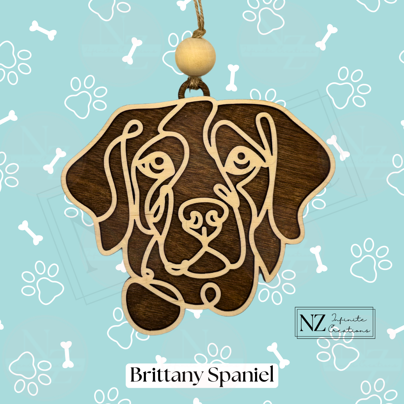 Brittany Spaniel Line Art Ornament made from wood with a laser-engraved design. Includes twine and a wooden bead for hanging. A great gift for Brittany Spaniel lovers and a charming addition to your holiday decor.