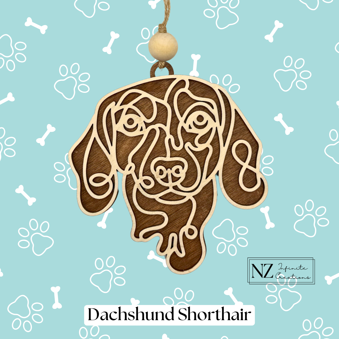 Dachshund Shorthair Line Art Ornament crafted from wood with a laser-engraved design. Includes twine and a wooden bead for easy hanging. A delightful gift for Dachshund Shorthair lovers and a charming addition to holiday or dog-themed decor.