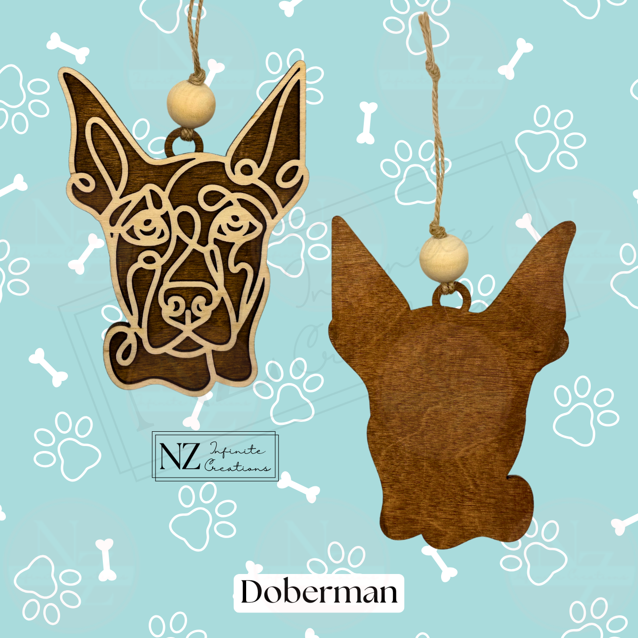 Doberman Line Art Ornament made from wood with a laser-engraved design. Includes twine and a wooden bead for easy hanging. A perfect gift for Doberman lovers and a striking addition to holiday decor or dog-themed collections.