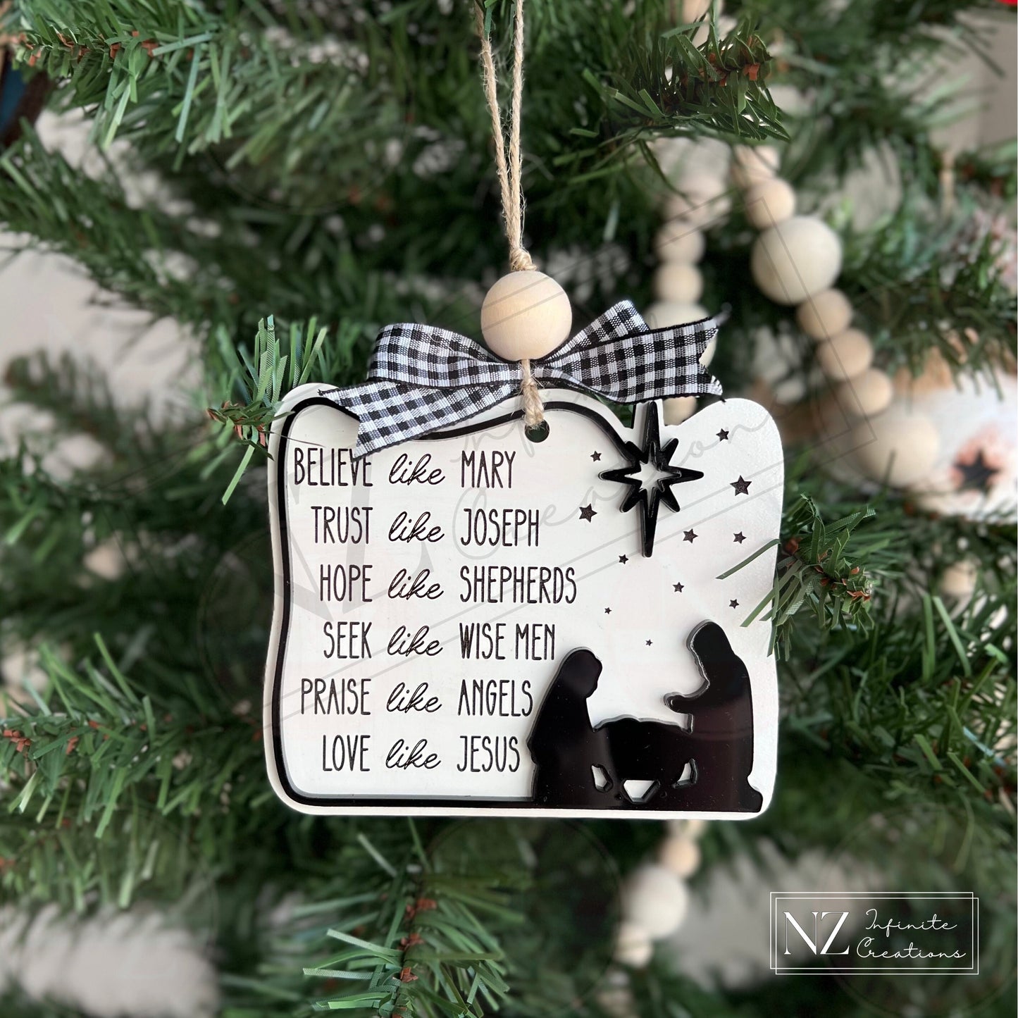 Believe like Mary, Trust like Joseph, Love like Jesus Ornament featuring an inspiring message. Made from wood with laser-engraved details, this ornament is a meaningful addition to Christmas decor or a thoughtful gift to share faith and love during the season.